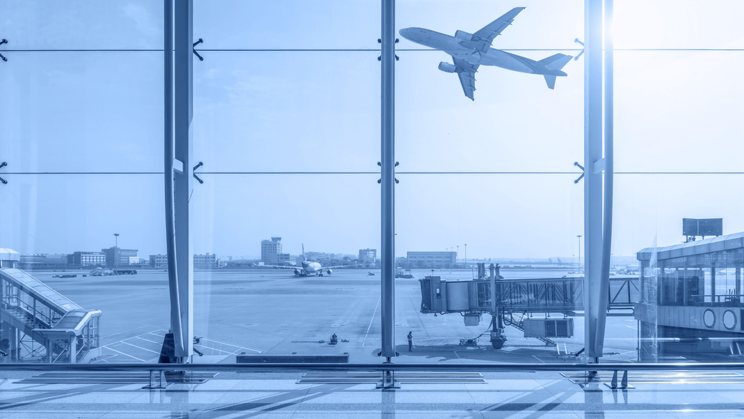 Airport terminal viewed through large windows