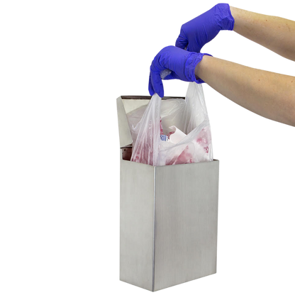 Gloved hands removing a restroom receptacle liner from a waste bin